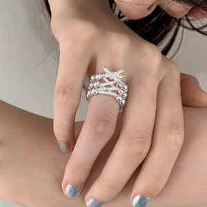 Multi-layer pearl ring with sparkling crystal ribbon design fashion jewelry for women