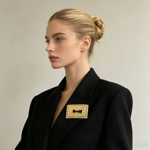Elegant vintage gold metal keyhole brooch, unique textured statement jewelry pin for women.