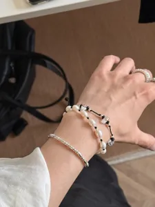Minimalist pearl crystal 3-piece bracelet set, elegant niche design women jewelry piece.