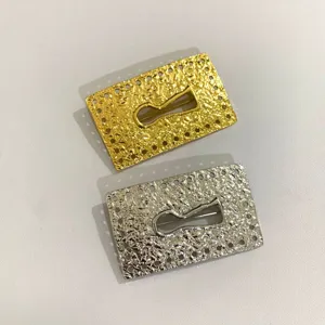 Retro metallic square keyhole textured earrings in gold and silver, statement style.