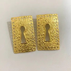 Vintage gold keyhole statement earrings for women, textured geometric drop earrings.