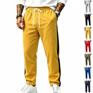 Men casual sports sweatpants detail view, loose straight fit with side contrast stripe design.