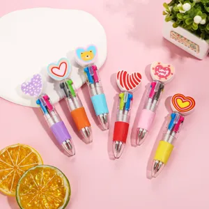 Cute multi-color ballpoint pens with cartoon heart toppers, creative student stationery.