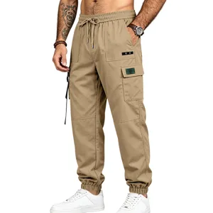 Detailed view of men's khaki cargo pants featuring multiple pockets and comfortable cuffed ankles.
