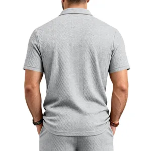 Ensemble polo et short d'été décontracté à manches courtes texturé gris pour homme.