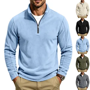 Close-up detail of mens quarter zip fleece sweatshirt with high collar and soft fabric.