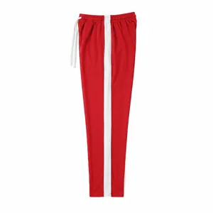 Men casual red sweatpants featuring a white side stripe and drawstring waist detail.