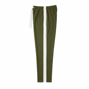 Men's casual loose fit sweatpants featuring white contrast side stripe detail view.