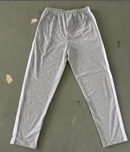 Mens casual grey sweatpants with white side stripes, loose straight leg jogging pants for daily wear.