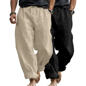 Close-up detail of men's loose linen casual beach trousers, showing comfortable fabric texture.