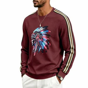 Men waffle knit long sleeve crewneck sweatshirt with tribal graphic and contrast side stripes.