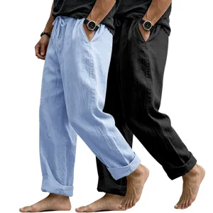 Detailed view of men's casual linen trousers with drawstring waist and straight leg fit.