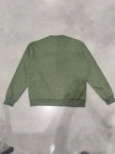 Back detail of casual green melange men long sleeve sweater, soft knit fabric and cuffs.