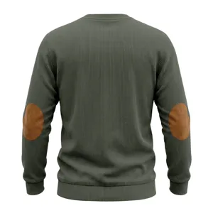 Detail view of back, solid green crewneck sweater with brown suede elbow patches.