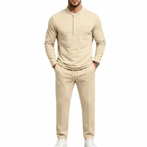 Detail view of men casual long sleeve henley shirt and loose trousers lounge set beige.