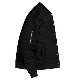 Men's black suede jacket sleeve and button detail showing premium texture.
