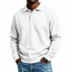 Close-up detail shot of men's waffle knit long-sleeve polo shirt with buttons texture.