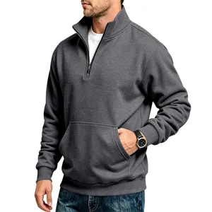Men's dark gray quarter zip fleece sweatshirt with stand collar and kangaroo pocket.