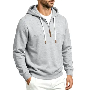 Lässiger Herren Fleece-Kapuzenpullover mit Viertelreißverschluss und modernem Paneel-Design.