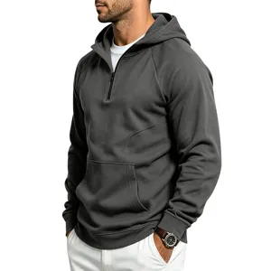 Detail view of men's dark gray quarter-zip hoodie with hood, front pocket, and soft fleece fabric.