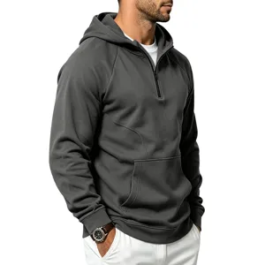 Close-up detail view of the dark grey half-zip hooded sweatshirt with front pocket.