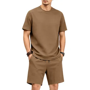 Detail view of brown textured men's casual short sleeve t-shirt and shorts summer set.