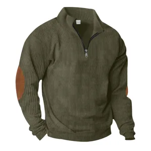 Close-up detail of the men's half-zip corduroy sweatshirt featuring elbow patches and stand collar.