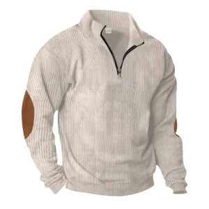 Detailed view of men's half-zip casual sweater with elbow patches and ribbed collar.