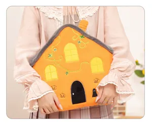 Halloween pumpkin house plush pillow detail view, soft cute cartoon cushion for home decor.