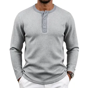Chemise henley à manches longues pour homme pull texturé vintage pour le printemps.