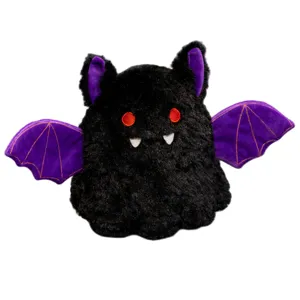 Cute black plush bat toy with purple wings and red eyes, soft Halloween stuffed animal doll.