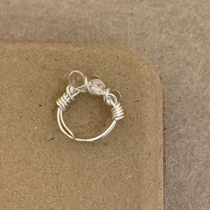 Handmade wire wrapped ring featuring clear beaded detail, exquisite daily jewelry.