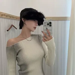 Stylish black faux fur equestrian hat and gradient knit top for autumn winter fashion daily wear.