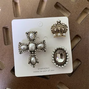 Vintage baroque rhinestone pearl brooch set with cross and crown for elegant wear.