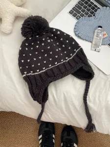 Korean style cute knit pom pom hat with earflaps and warm winter design for women.