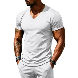 Detailed view of white athletic V-neck short sleeve shirt and shorts mesh breathable fabric.