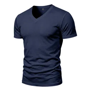 Close-up of breathable mesh fabric, V-neck design, and elastic short sleeve details.