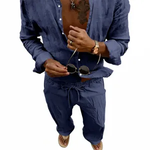 Close-up detail view of mens casual navy blue linen long sleeve shirt and pants outfit.