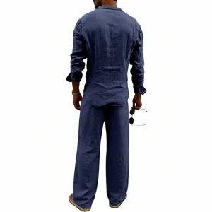 Detail view of men's casual loose linen long sleeve shirt and straight pants set in navy blue.