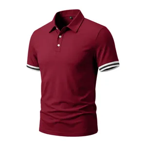 Detail view of a stylish burgundy short-sleeve polo shirt with contrast striped cuffs.