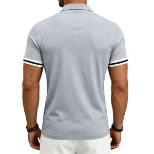Men's casual grey polo shirt back view detail showing contrast cuffs and collar trim styling.