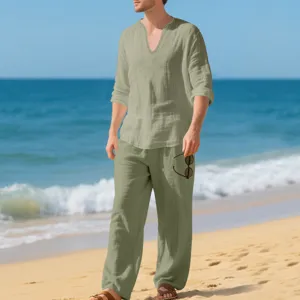 Detail view of men's casual linen long sleeve shirt and pants set, perfect for beach wear.