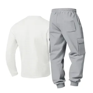 Detail view of men's casual waffle long sleeve top and grey cargo sweatpants set.