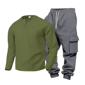 Detail shot of mens waffle long sleeve henley shirt and cargo sweatpants set in olive and grey.