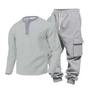 Men grey waffle knit Henley long sleeve shirt and cargo sweatpants casual two piece set.