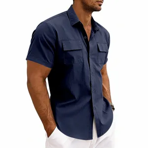 Men's short sleeve utility shirt detail, solid navy blue color, casual double pocket design.
