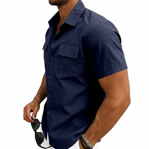 Close-up detail of dark blue short sleeve utility shirt with double chest pockets.