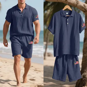 Detailed view of men linen polo shirt and shorts set beach wear with flag embroidery.