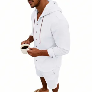 Detail view of men's casual linen hooded shirt and shorts set, showing breathable fabric.