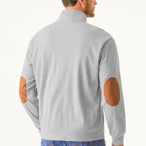 Detail view of men's corduroy stand collar jacket with stylish elbow patches and texture.